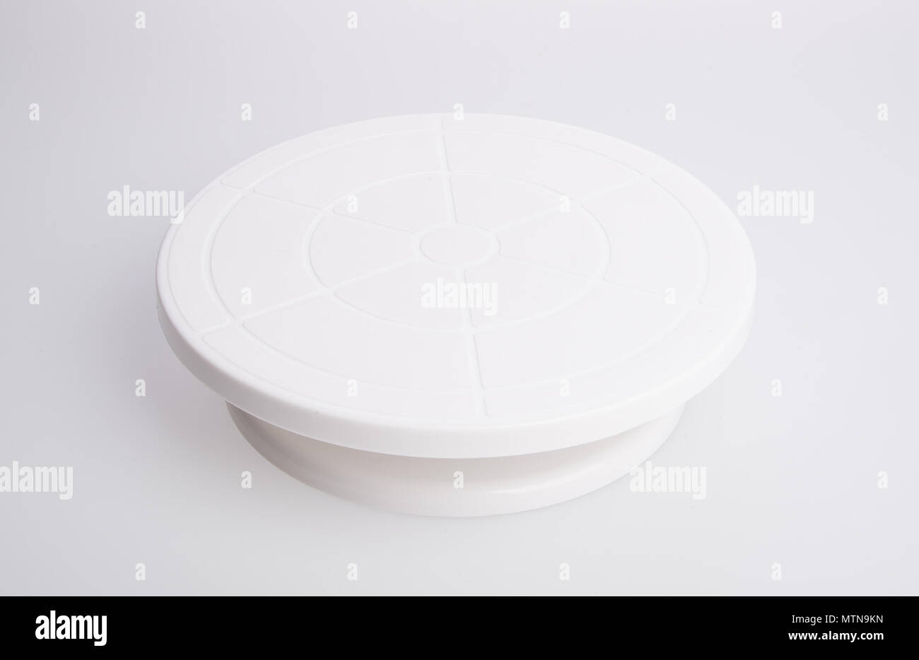 cake stand or rotating cake stand on a background Stock Photo