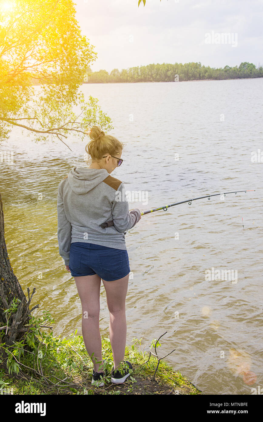 Girl fishing pole young hi-res stock photography and images - Page 4 - Alamy