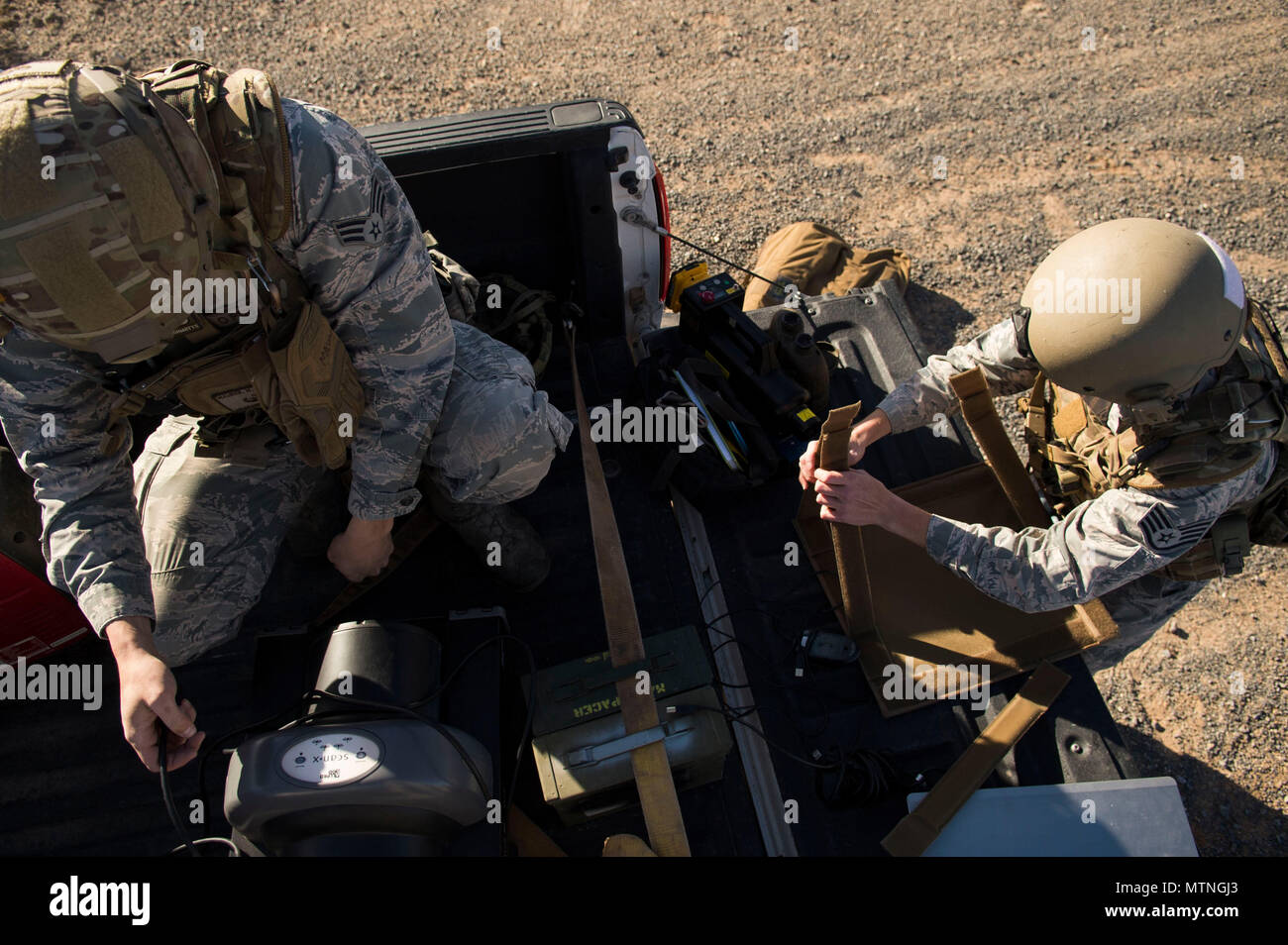 Senior Airman Matt Maurer (left), and Staff Sgt. Jacque Risley, both ...