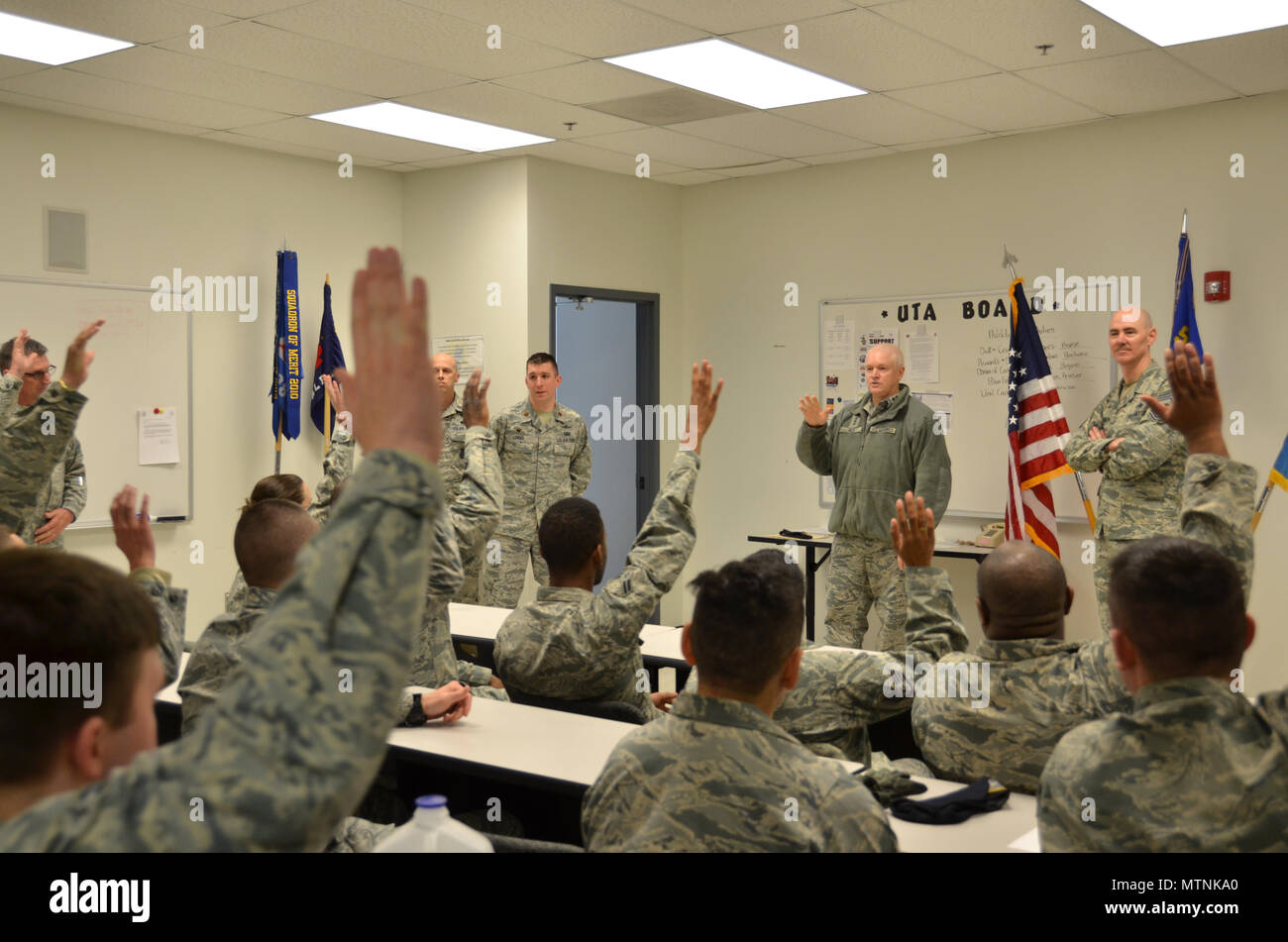 New Castle Air National Guard Base Del Members Of The 166th Security Forces Squadron 166th Communications Flight And The 166th Airlift Wing Raise Their Hands To Indicate The Number Of Traditional Guardsmen
