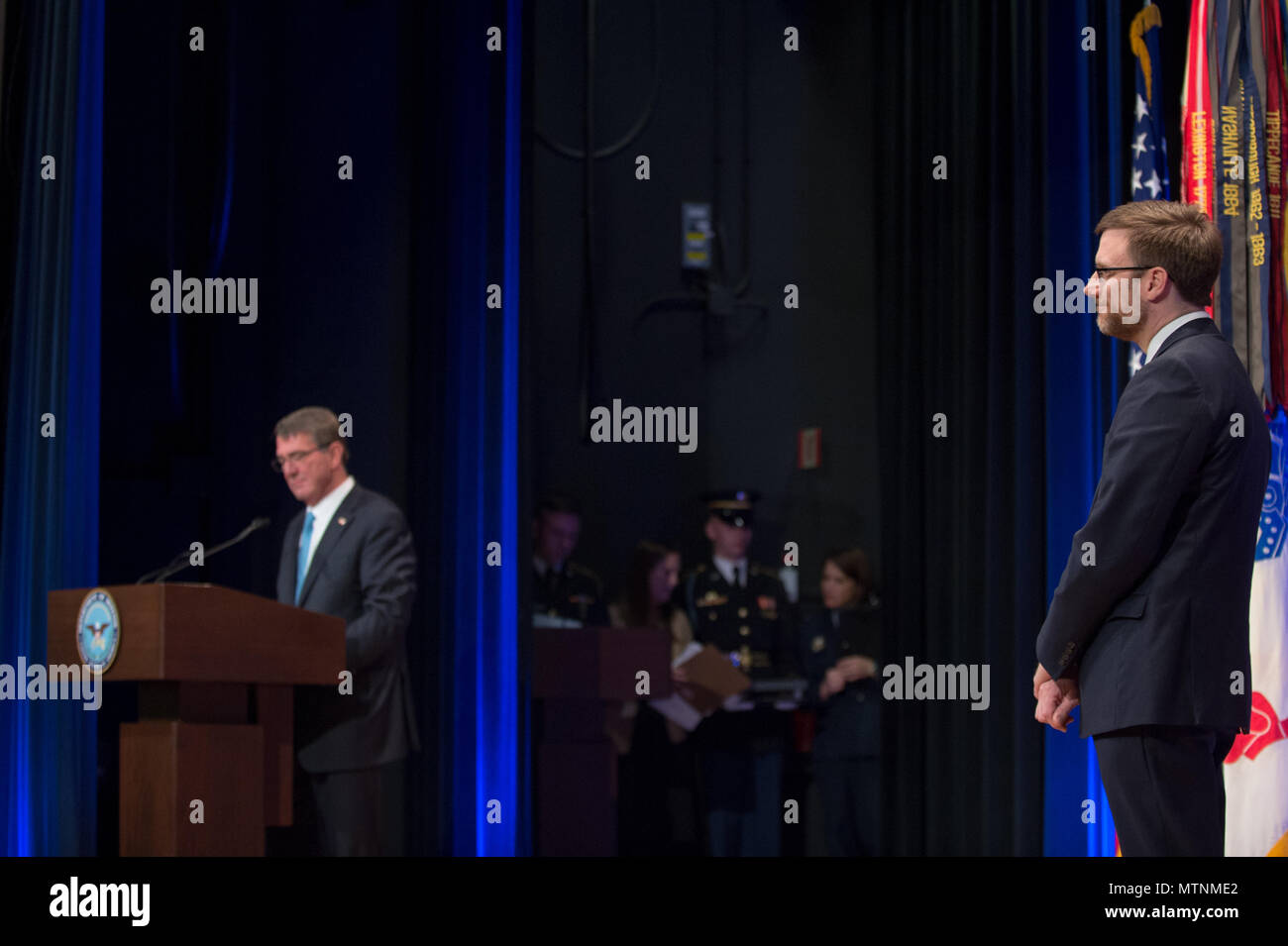 Defense Secretary Ash Carter recognizes the Director of Cost Assessment