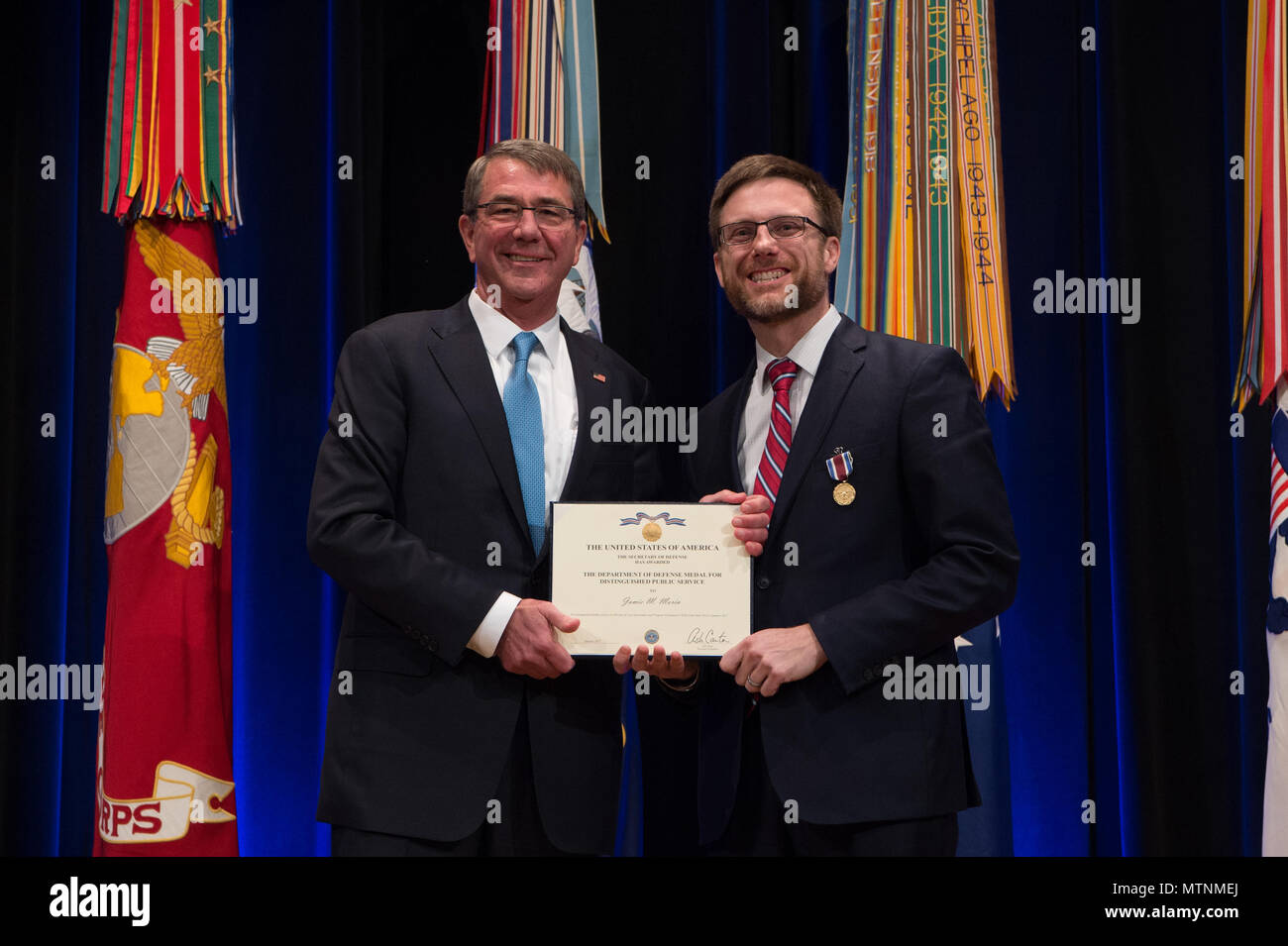 Defense Secretary Ash Carter recognizes the Director of Cost Assessment