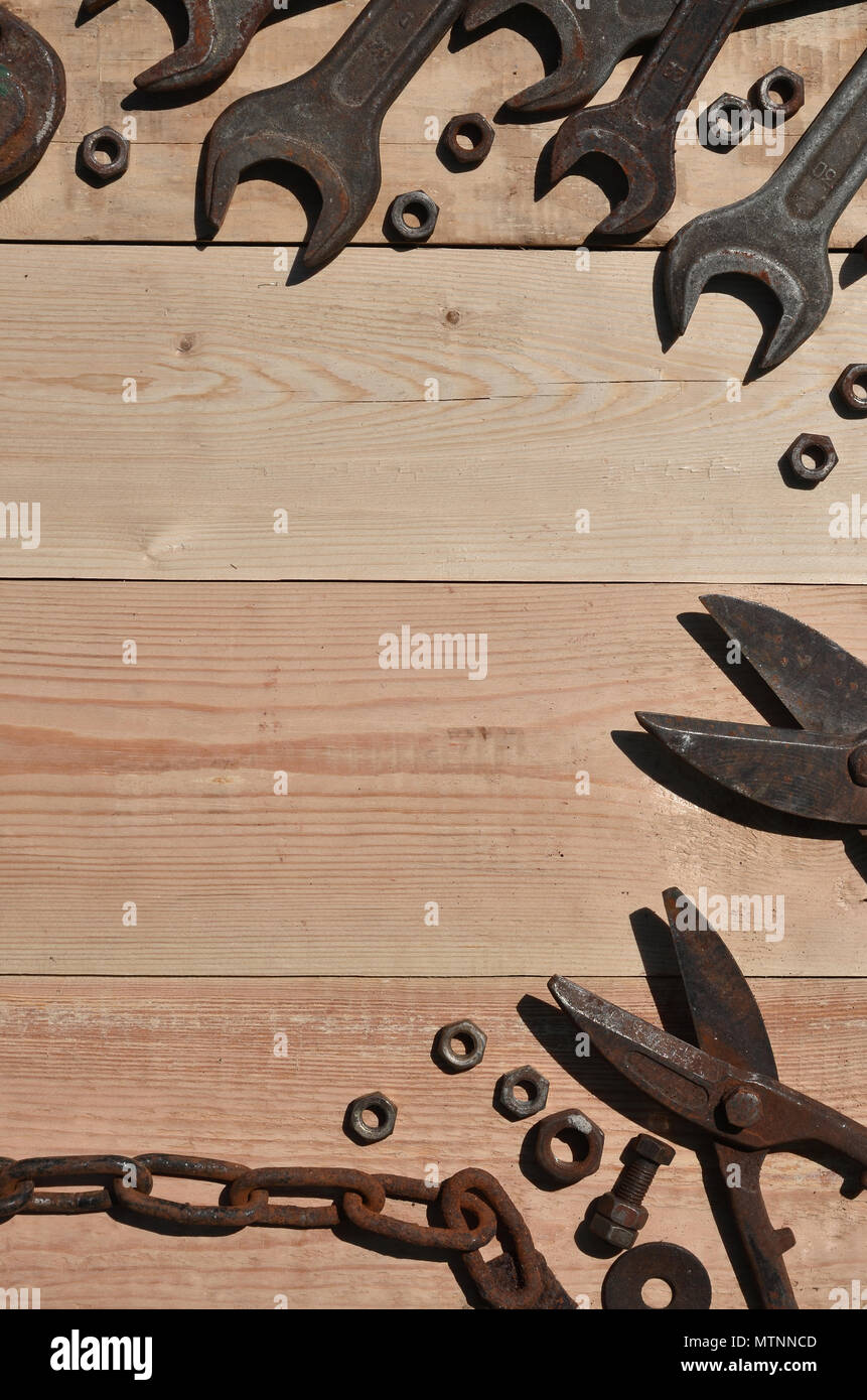 A set of old and rusty tools for handyman. A lot of obsolete household ...