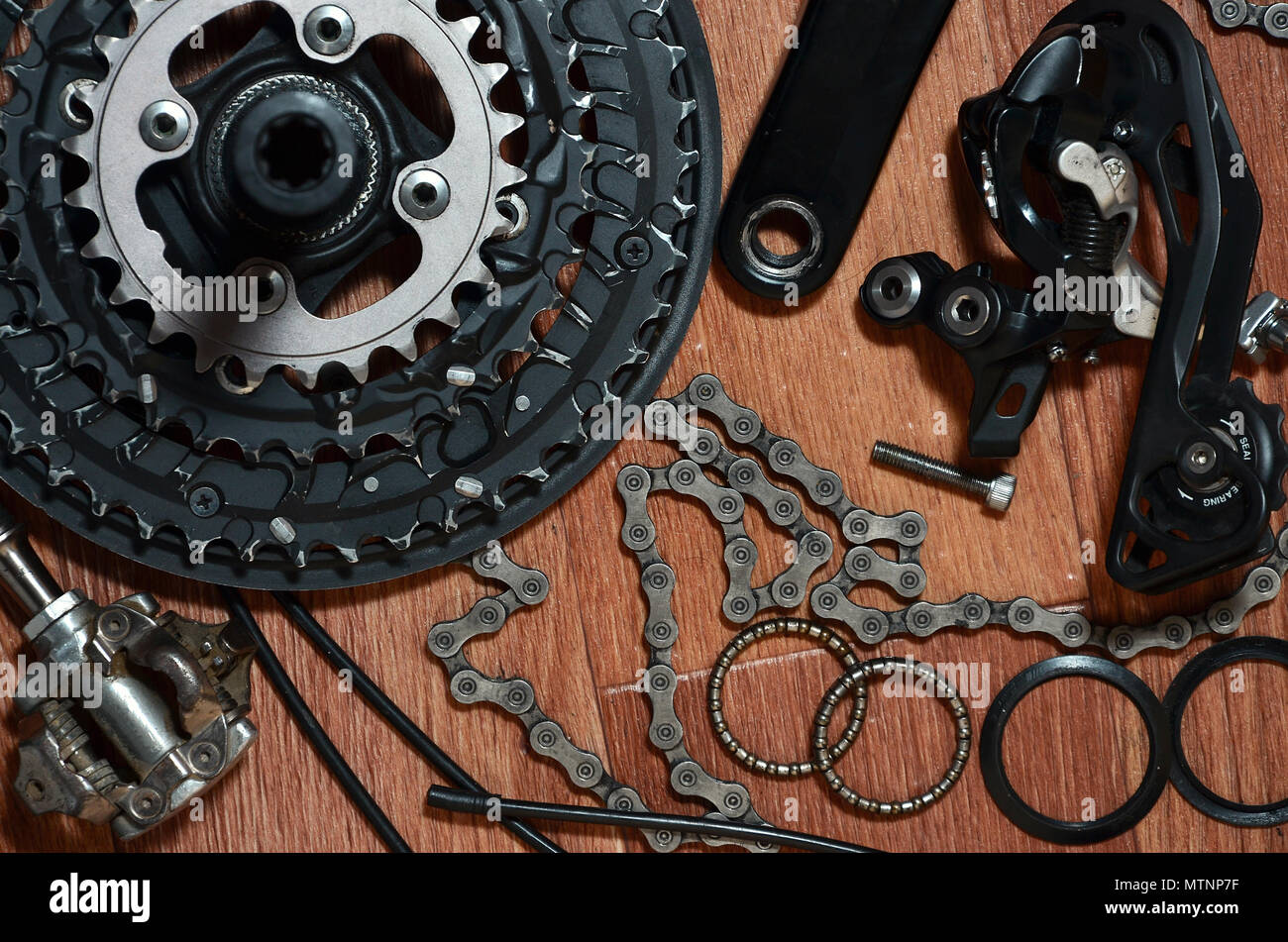 Many different metal parts and components of the running gear of a
