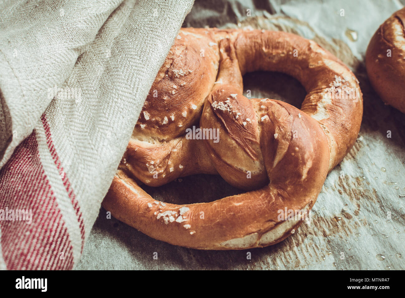 Rustic Look Pretzels From the Oven on Baking Sheet Stock Photo
