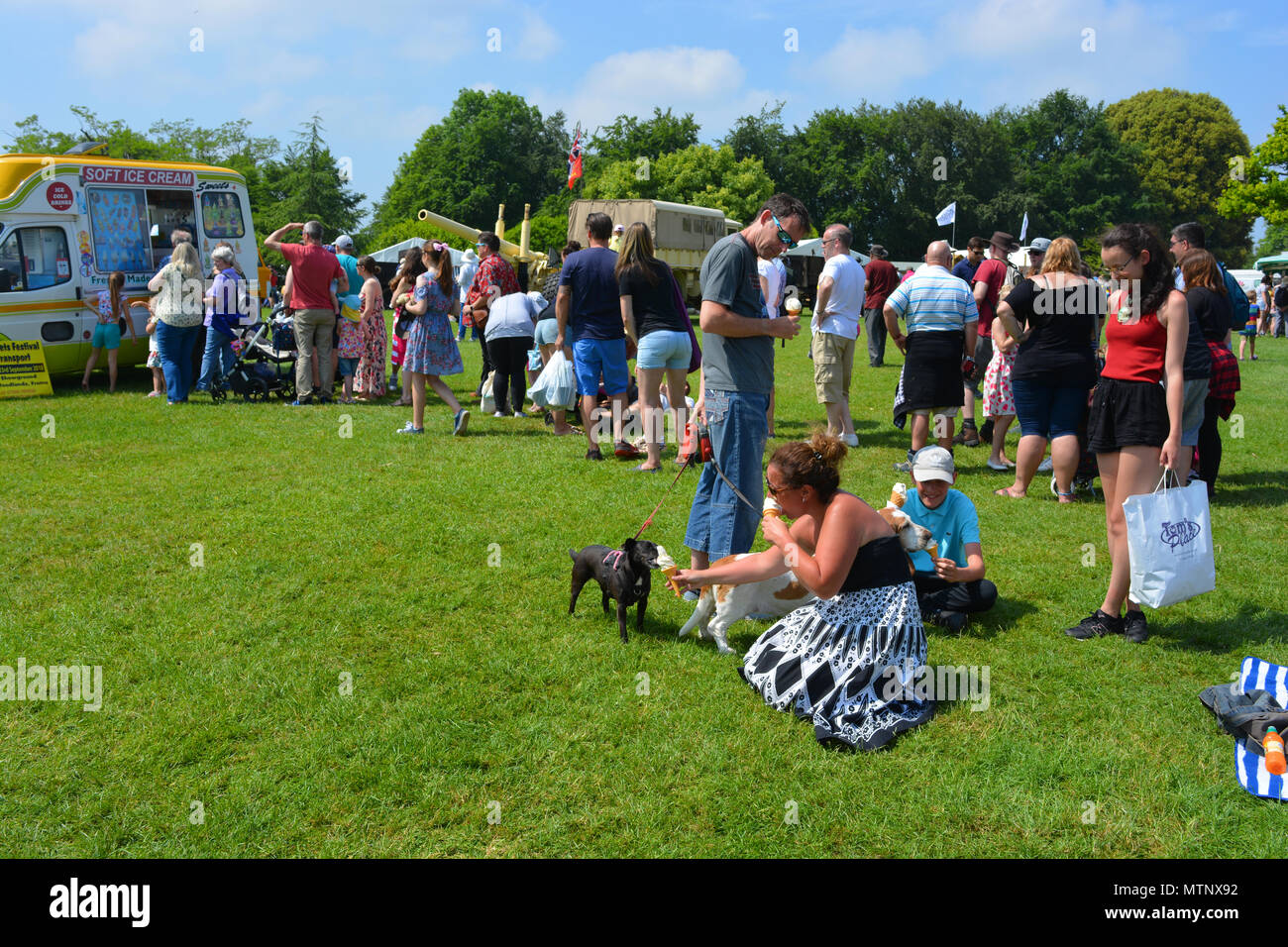Queue at a Soft Ice Cream van on a hot and sunny bank holiday at the annual  Sherborne Castle Country Fair, Sherborne, Dorset, England Stock Photo -  Alamy