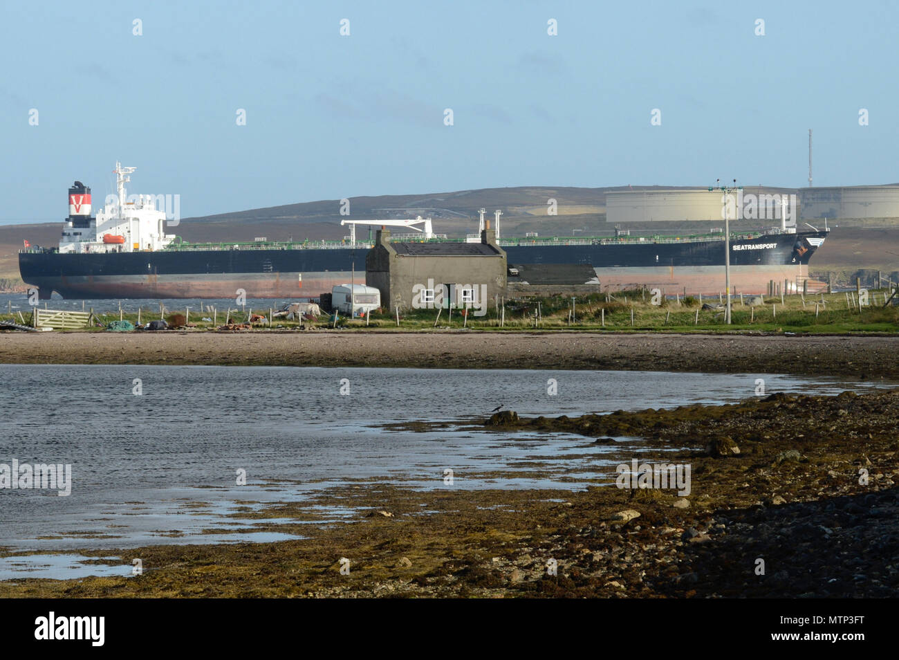 Sullom Voe Oil Terminal in the Shetland island with tanker arriving at