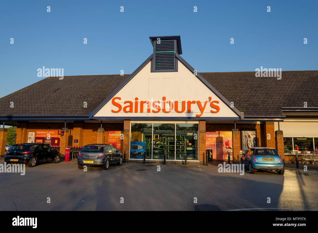 Flint, UK: May 22, 2018: Sainsbury's store in Flint. Sainsbury's who are in the process of merging with Asda have recently restructured their staffing Stock Photo