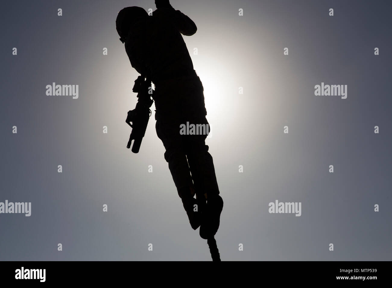 A U.S. Marine with Battalion Landing Team 1st Battalion, 4th Marines ...