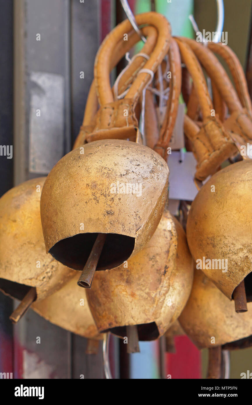 Copper cow bells with Leather handles Stock Photo Alamy