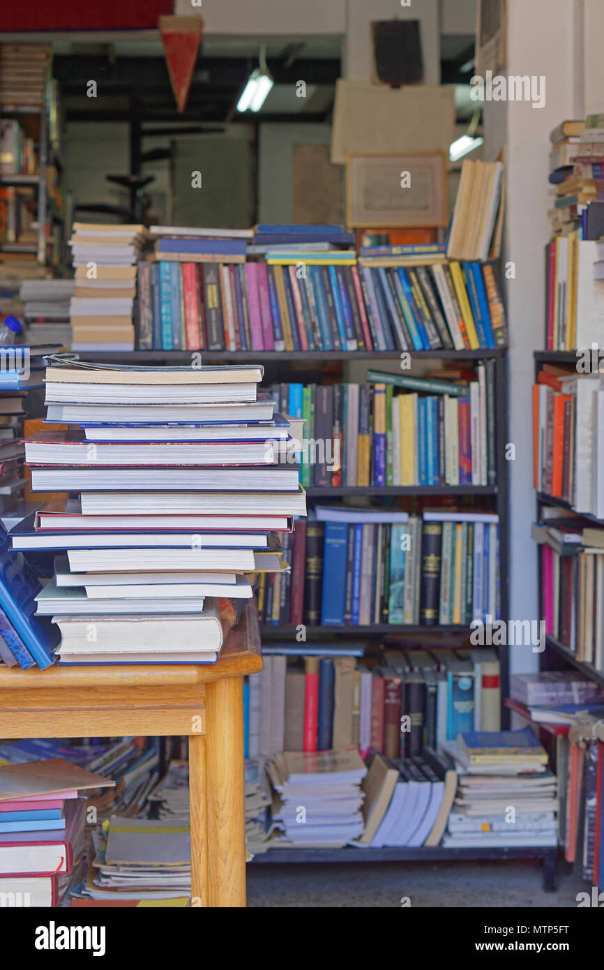 Big collection of used books in bookshop Stock Photo - Alamy