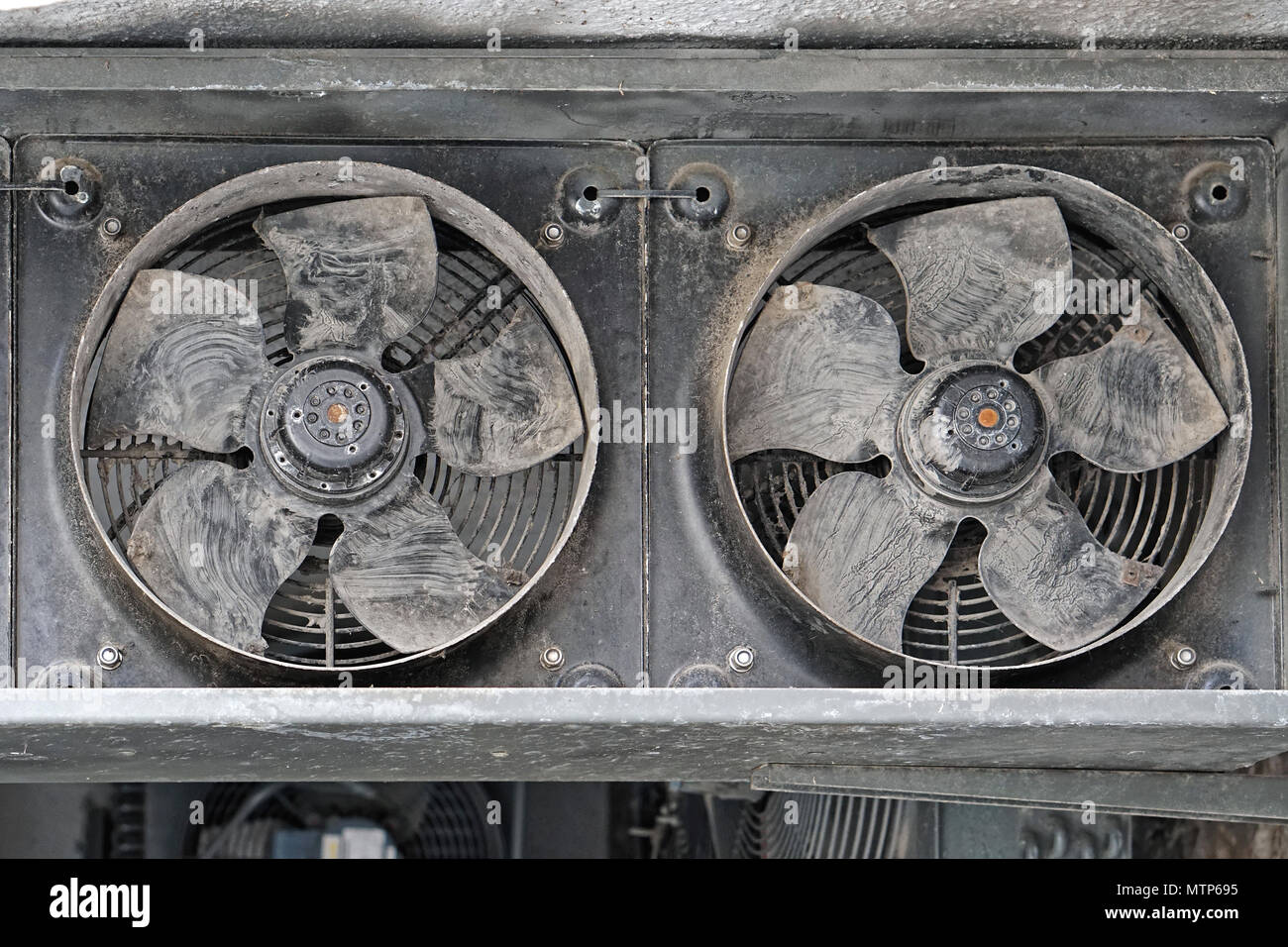 Two Industrial Cooling Fans Covered With Dust And Dirt Stock Photo Alamy