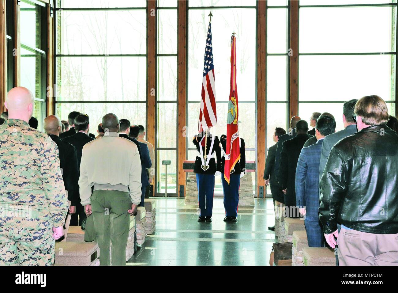 Marines from the Marine Corps Base Quantico Color Guard present the colors during the ribbon-cutting ceremony for MSSA at Quantico on Jan. 8, 2018.  (Photo courtesy of Microsoft Software & Systems Academy) Stock Photo