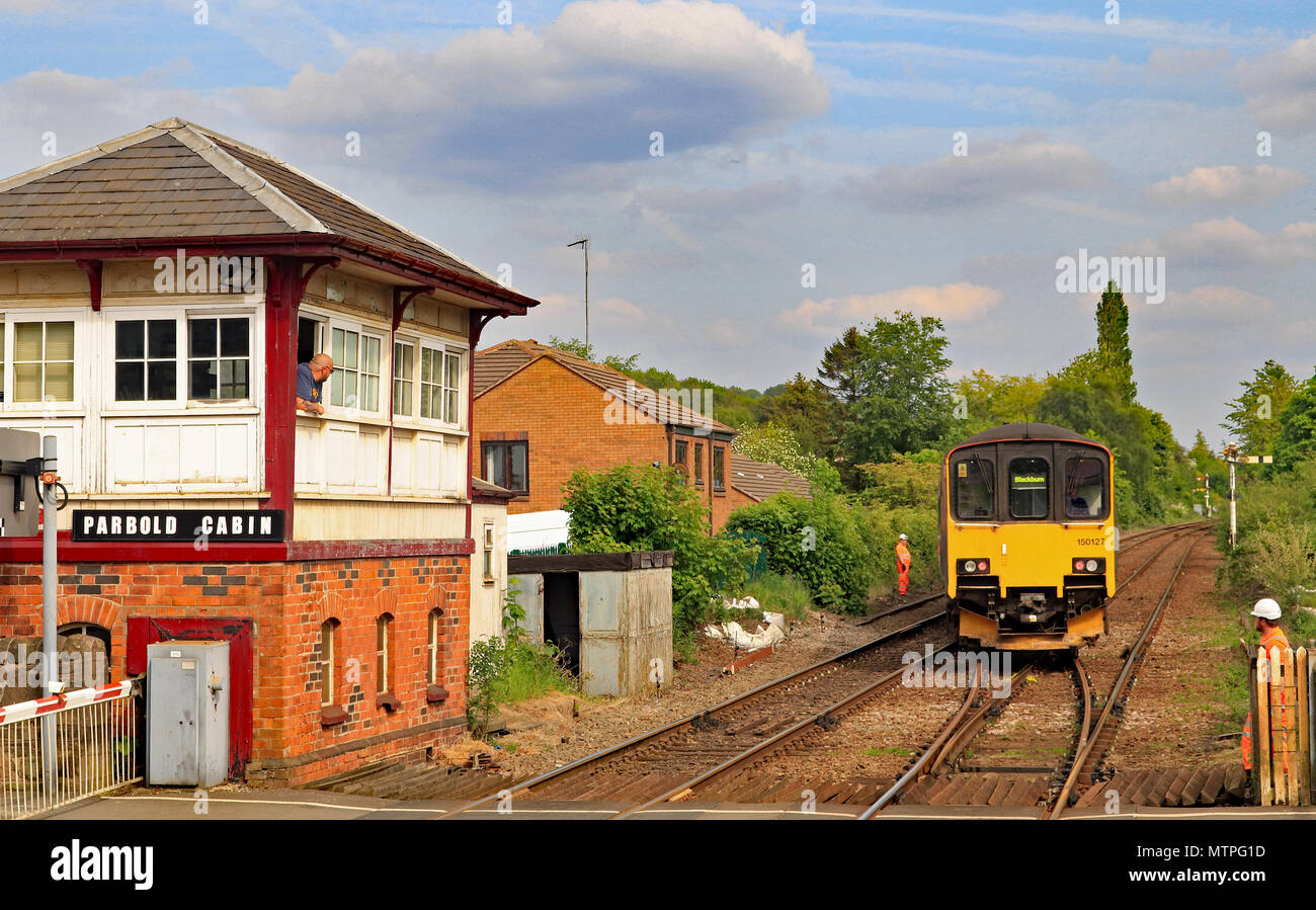 Cw 6192 150127 passes over points at Parbold 20.5.18.  Northern train unit no 150127 crosses from the down to the up line at Parbold on the 20.5.18.   Stock Photo