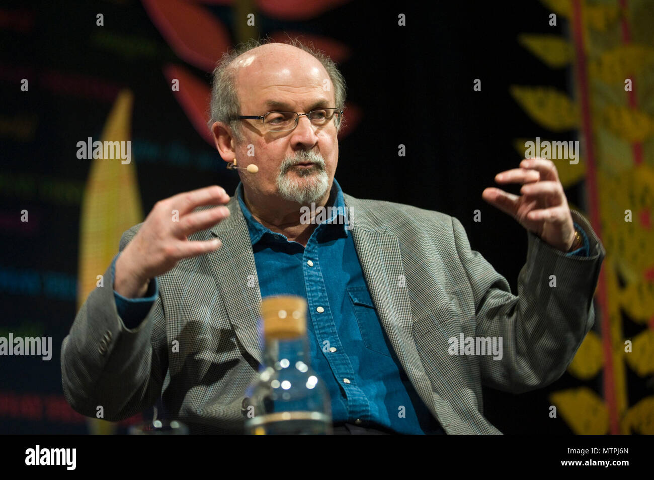 Salman Rushdie speaking on stage in the Tata Tent at Hay Festival 2018 Hay-on-Wye Powys Wales UK Stock Photo