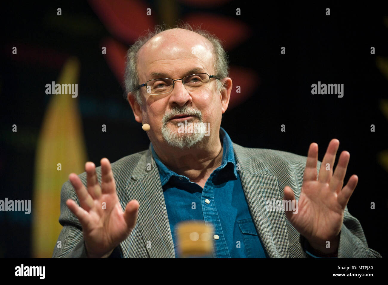 Salman Rushdie speaking on stage in the Tata Tent at Hay Festival 2018 Hay-on-Wye Powys Wales UK Stock Photo