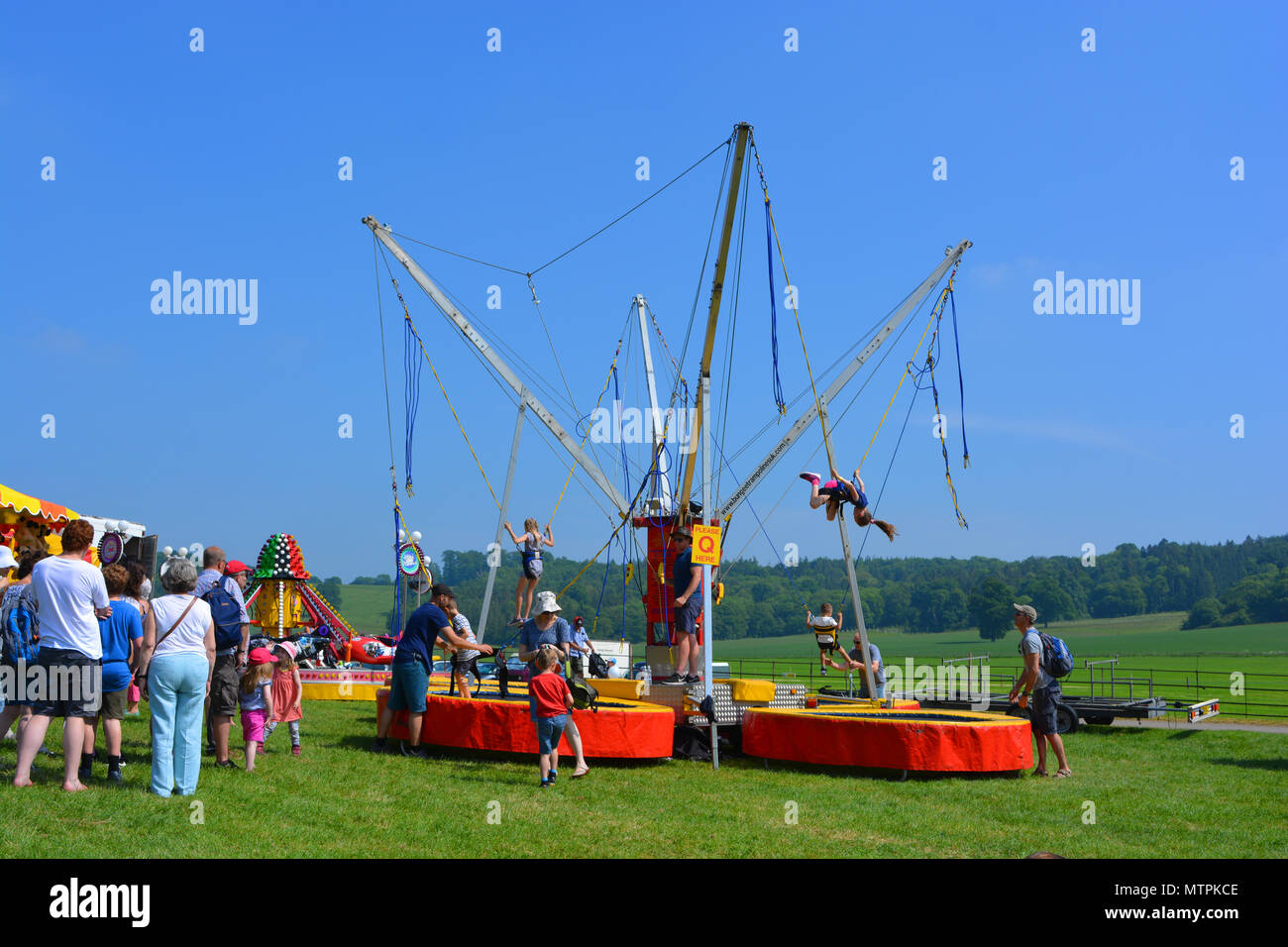 Bungee jumping  at the annual Sherborne Castle Country Fair, Sherborne, Dorset, England. Stock Photo