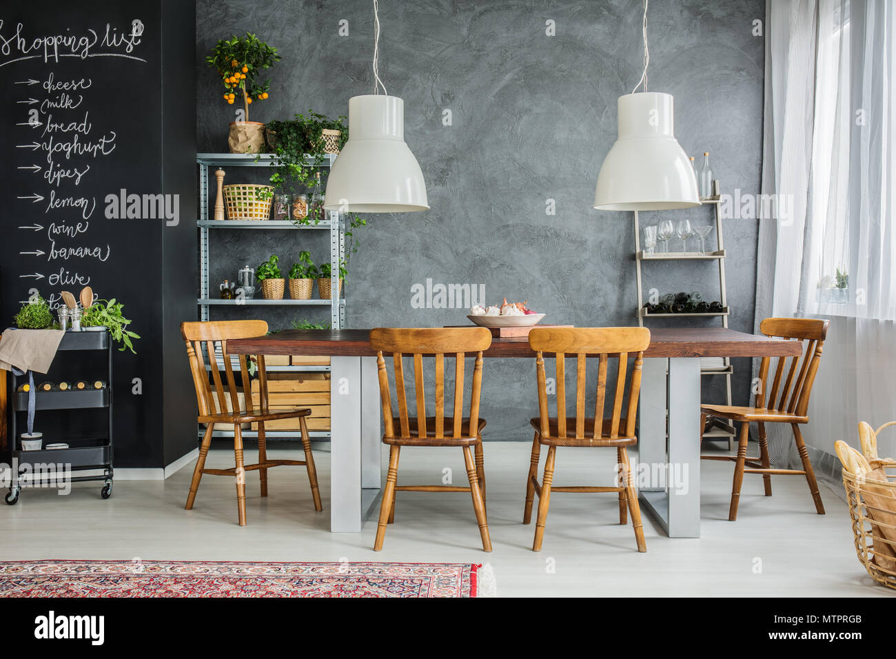Dining room with table for big family Stock Photo Alamy