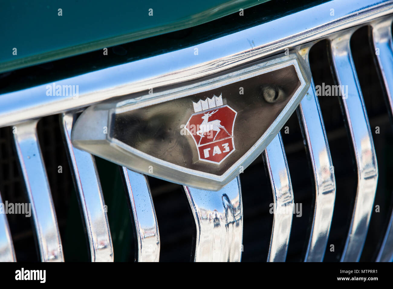 KHARKIV, UKRAINE - 27 MAY, 2018: The emblem of the car is a retro old GAZ close-up. Stock Photo
