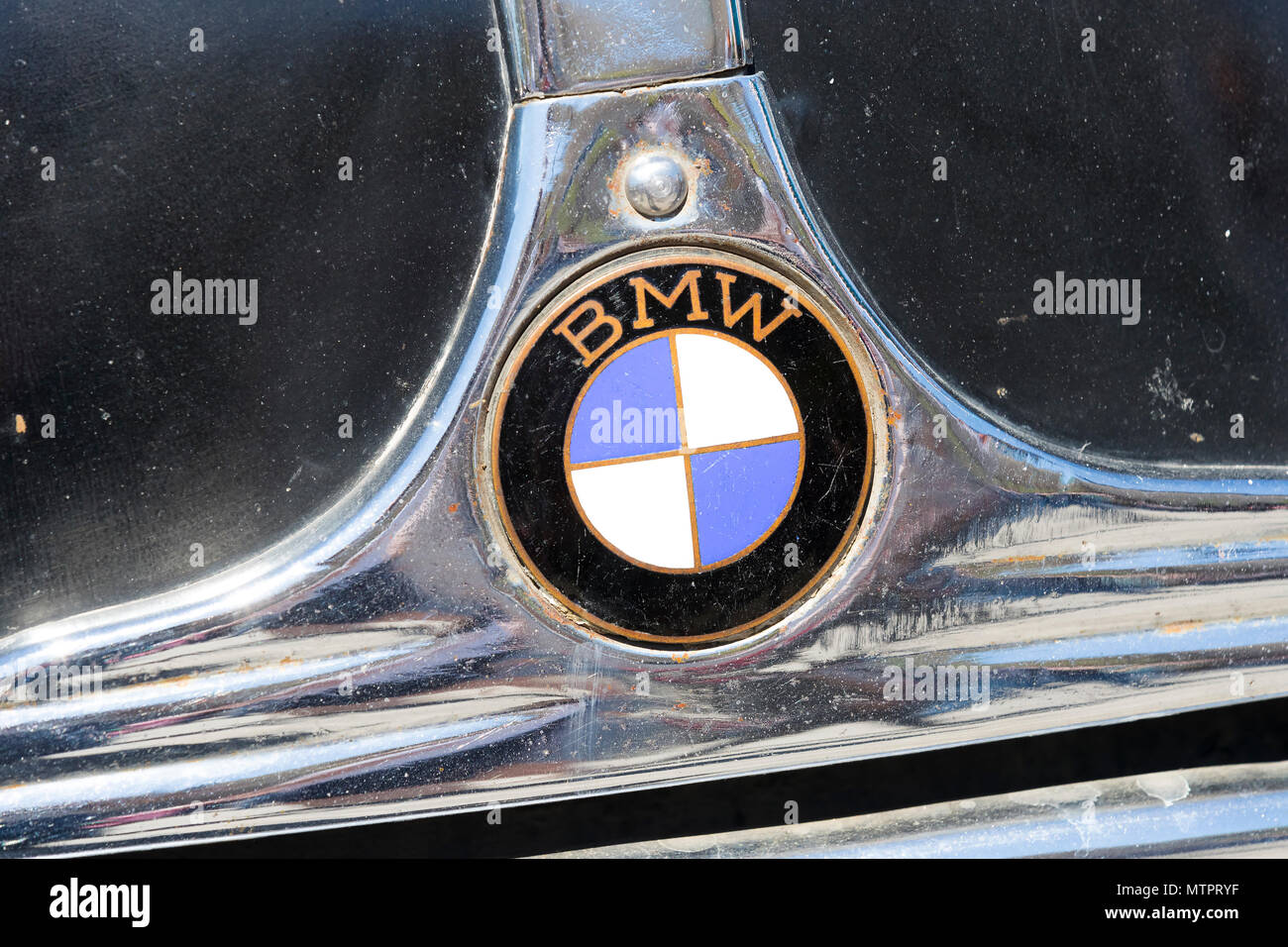 KHARKIV, UKRAINE - 27 MAY, 2018: The emblem of the car is a retro old BMW close-up. Stock Photo