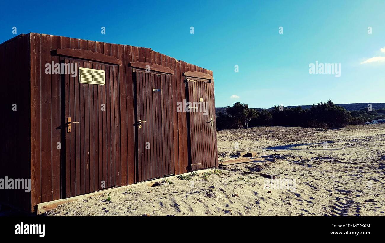 Little wooden toilet cabin in the beach Stock Photo