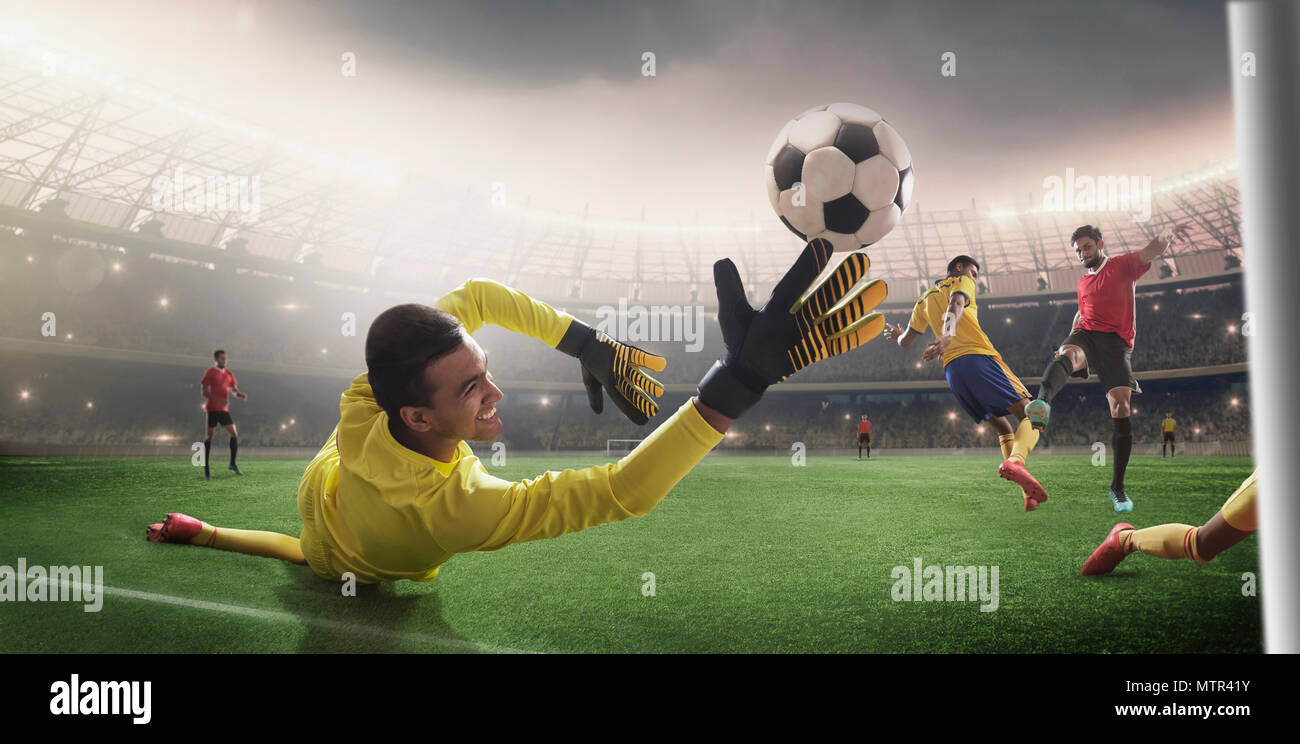 Football game moment with goalkeeper Stock Photo Alamy