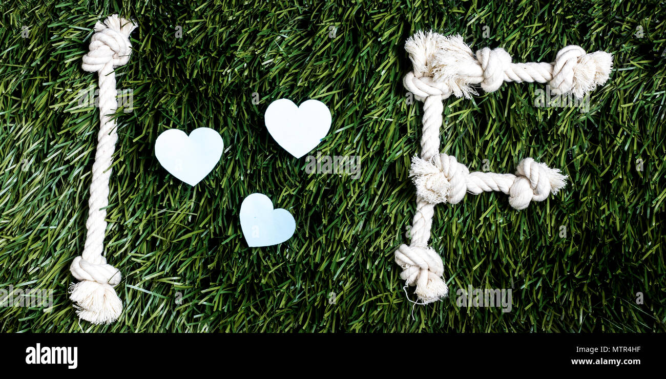I and F letters and three paper heart cut outs on grass Stock Photo - Alamy
