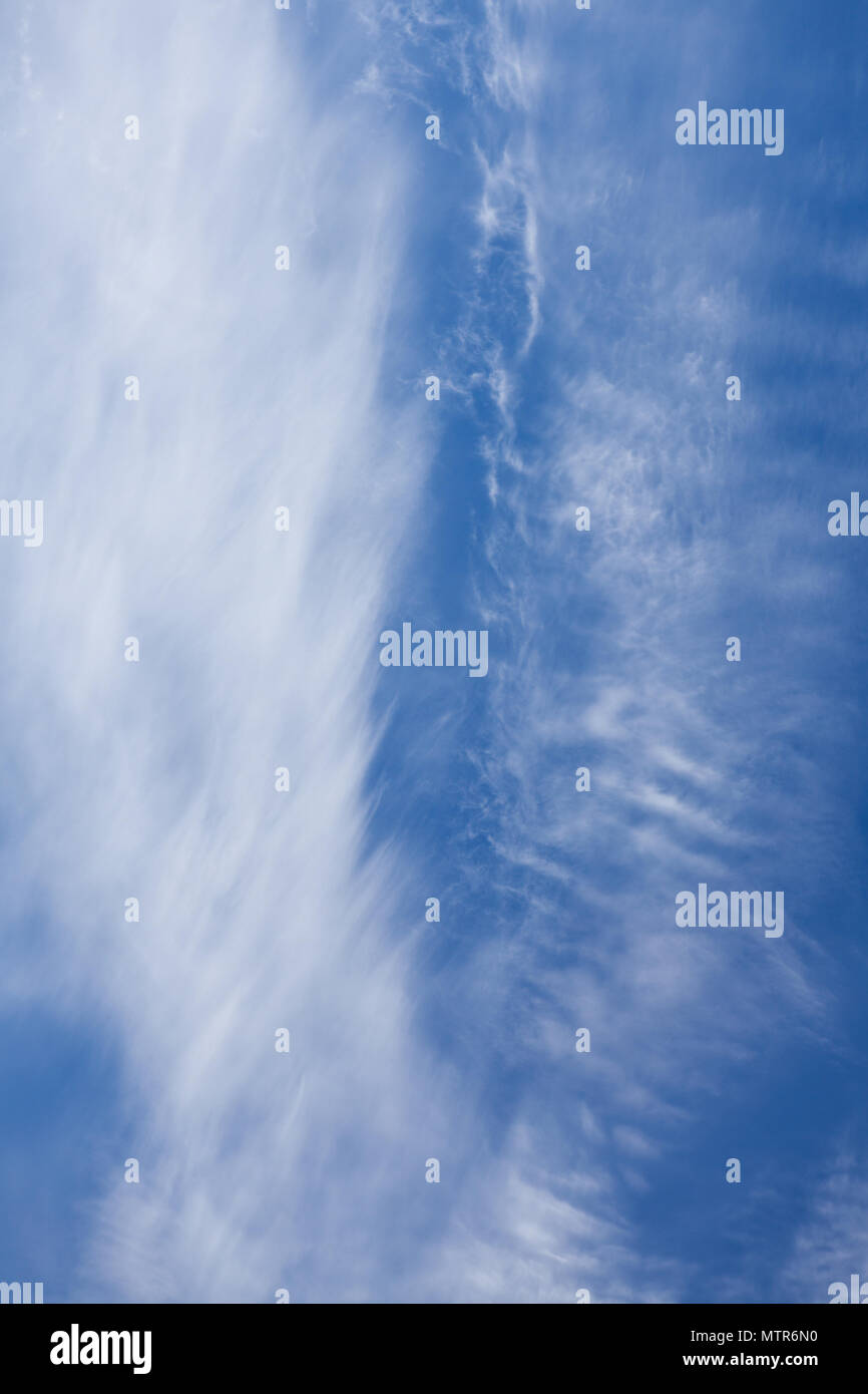 Wispy cirrus clouds blue sky Stock Photo - Alamy