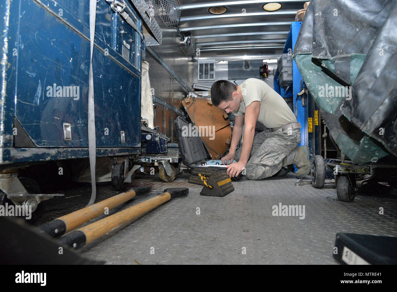 Senior Airman Justin Vasquez, 341st Missile Maintenance Squadron maintenance technician, takes inventory of equipment inside a maintenance van Jan. 17, 2017, at Malmstrom Air Force Base, Mont. The van is taken out to each work location and is used to house all 3,500 pounds of equipment the maintenance teams need to complete a job. (U.S. Air Force photo/Airman 1st Class Daniel Brosam) Stock Photo
