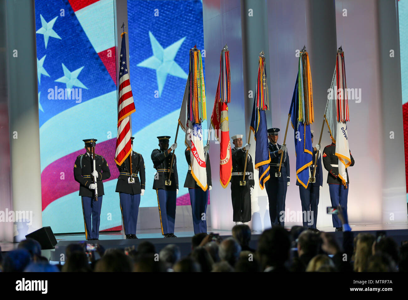A Joint Services Color Guard presents the colors during the National