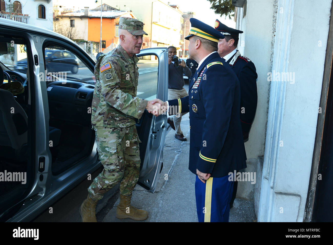 U.S. Army Col. Darius S. Gallegos (right), CoESPU deputy director, welcomes Lt. Gen. Charles D. Luckey (left), Commanding General U.S. Army Reserve Command, during visit at Center of Excellence for Stability Police Units (CoESPU) Vicenza, Italy, January 20, 2017.(U.S. Army Photo by Visual Information Specialist Paolo Bovo/released) Stock Photo