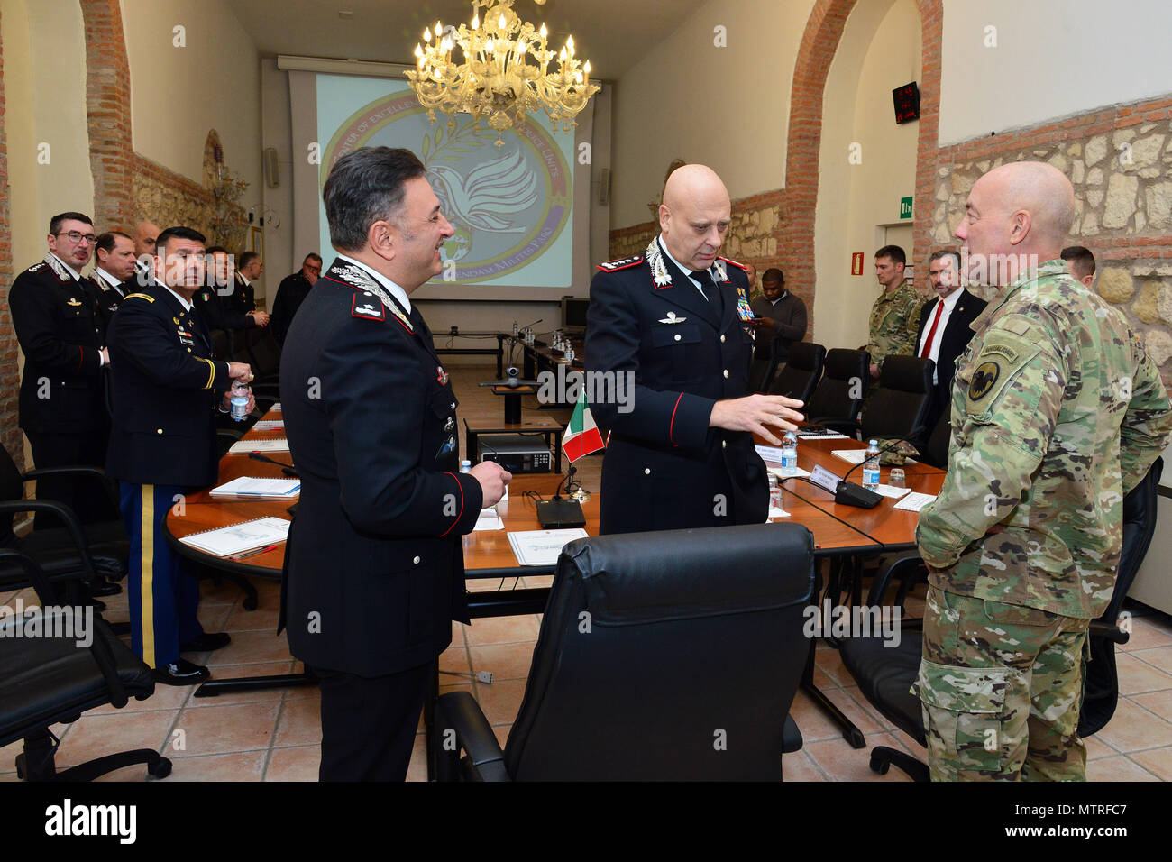 Brig. Gen. Giovanni Pietro Barbano (right), Center of Excellence for Stability Police Units (CoESPU) director, Lt. Gen Vincenzo Coppola (center), Commanding General “Palidoro” Carabinieri Specialized and Mobile Units, Lt. Gen. Charles D. Luckey (left), Commanding General U.S. Army Reserve Command, talk during visit at Center of Excellence for Stability Police Units (CoESPU) Vicenza, Italy, January 20, 2017.(U.S. Army Photo by Visual Information Specialist Paolo Bovo/released) Stock Photo