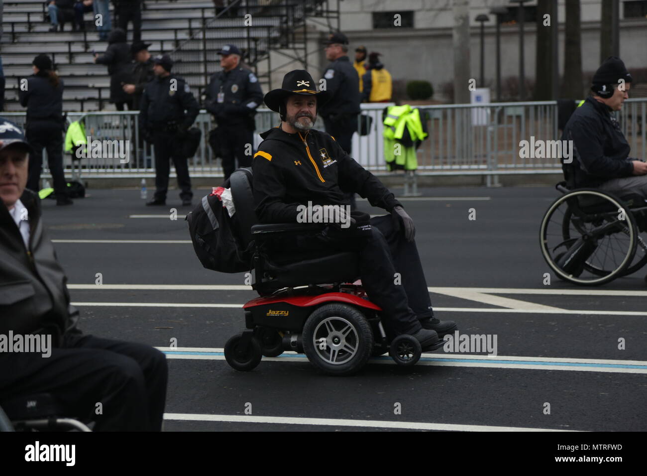 Members of Paralyzed Veterans of America march in the 58th Presidential
