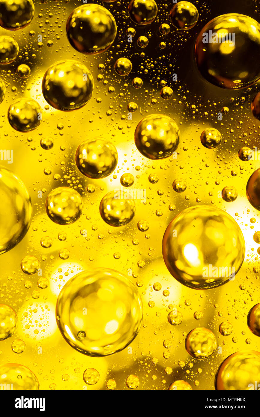 Download Water Drops On Glass With A Yellow Lighted Background Stock Photo Alamy PSD Mockup Templates