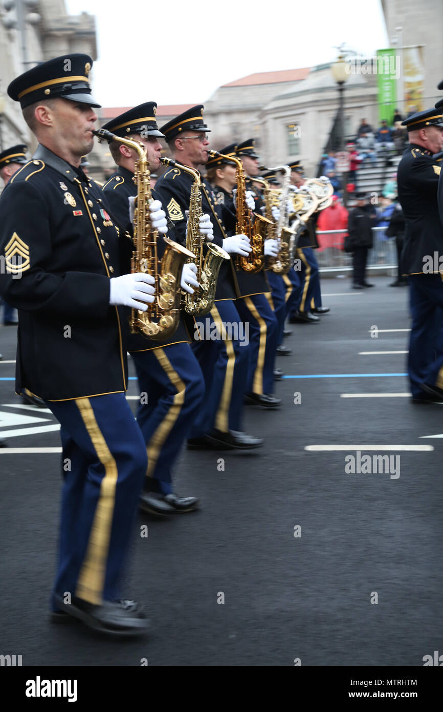 Members of the U.S. Army Field Band march by Freedom Plaza along ...