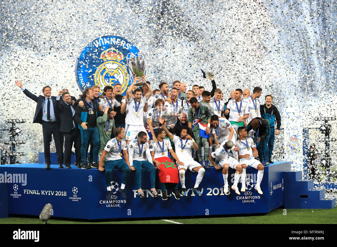 Real Madrid's Fernandez Nacho (centre left) lifts the trophy Real Madrid's Fernandez Nacho (centre left) lifts the trophy