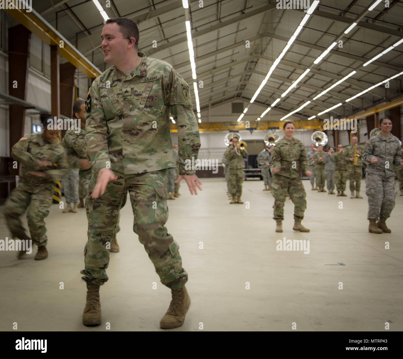 Sgt. James Motz works his Elvis moves in preparation for the Musikschau ...