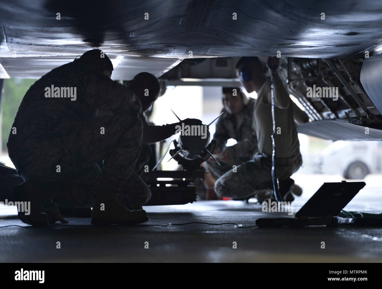 U.S. Air Force Airmen from the 43rd Aircraft Maintenance Unit prepare ...