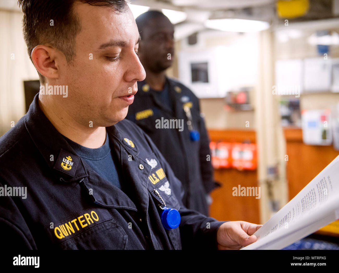 A Chief Personnel Specialist proctors the Navywide E-7 advancement exam ...