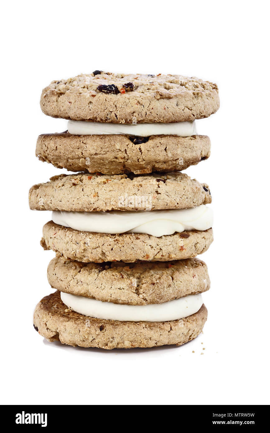 Carrot cake cookies sandwiches stuffed with cream cheese icing isolated