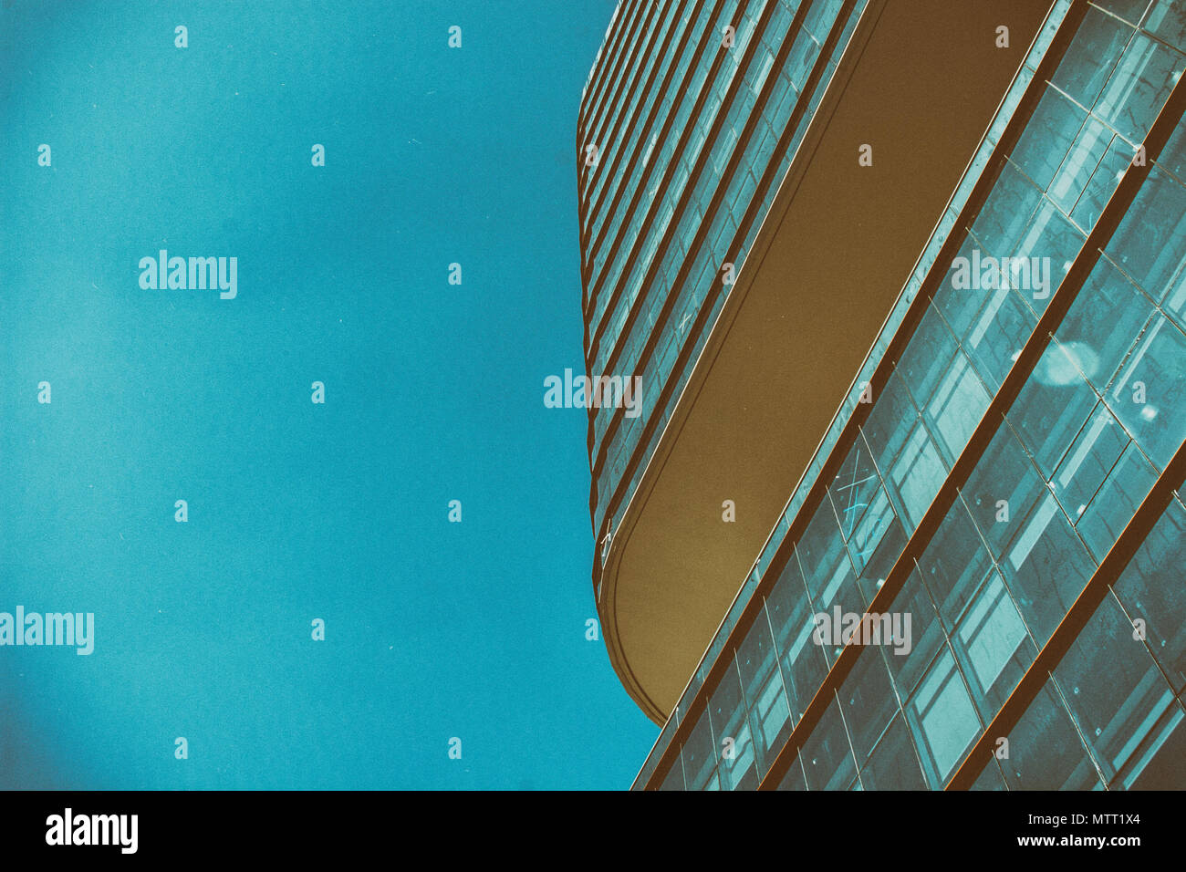 A rounded corporate building detail facede in a vintage style image ...