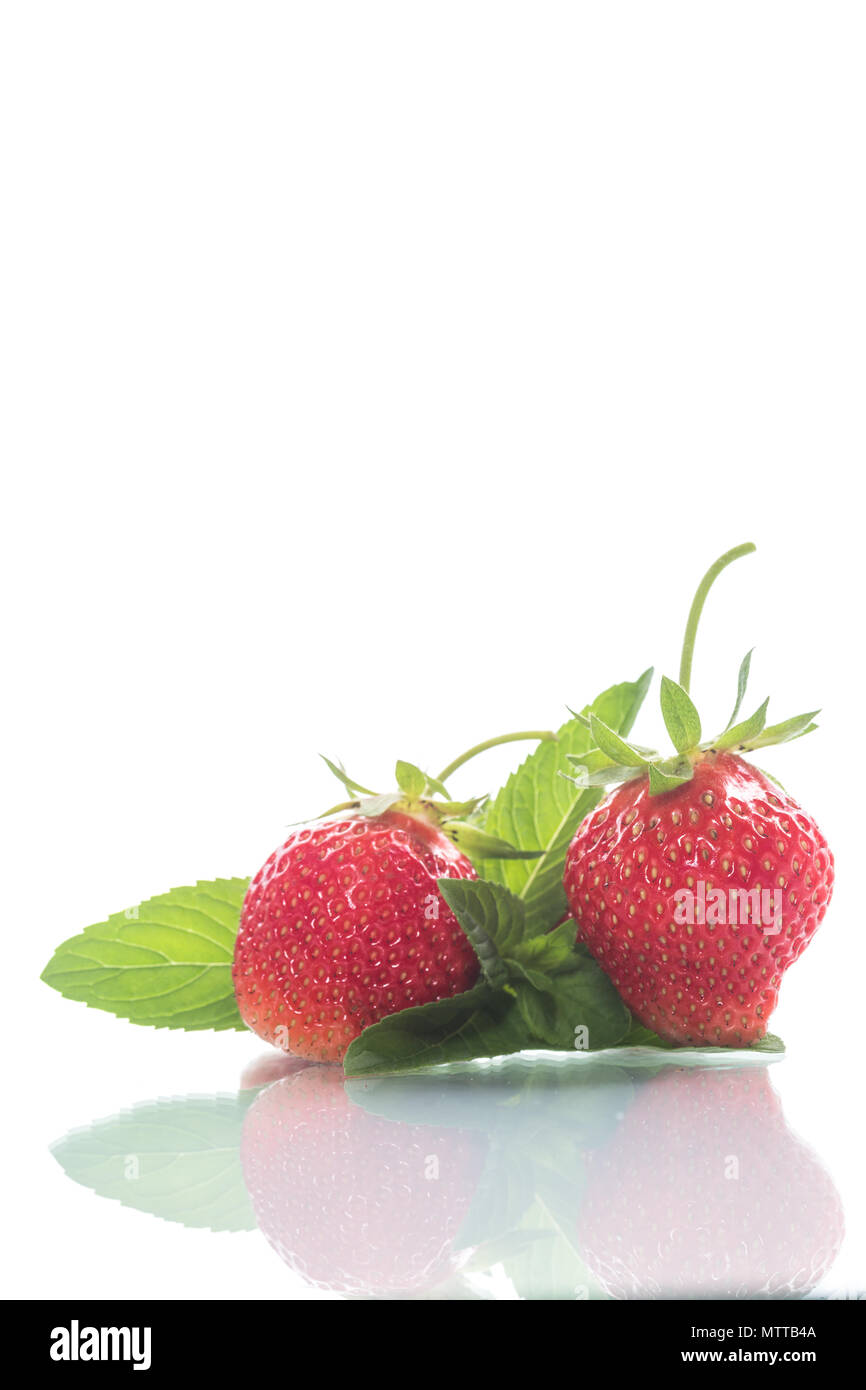 ripe red organic strawberry on a white background Stock Photo