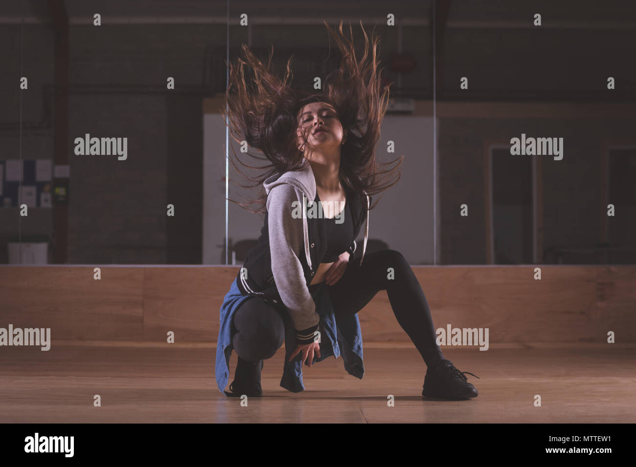 Female dancer dancing in dance studio Stock Photo