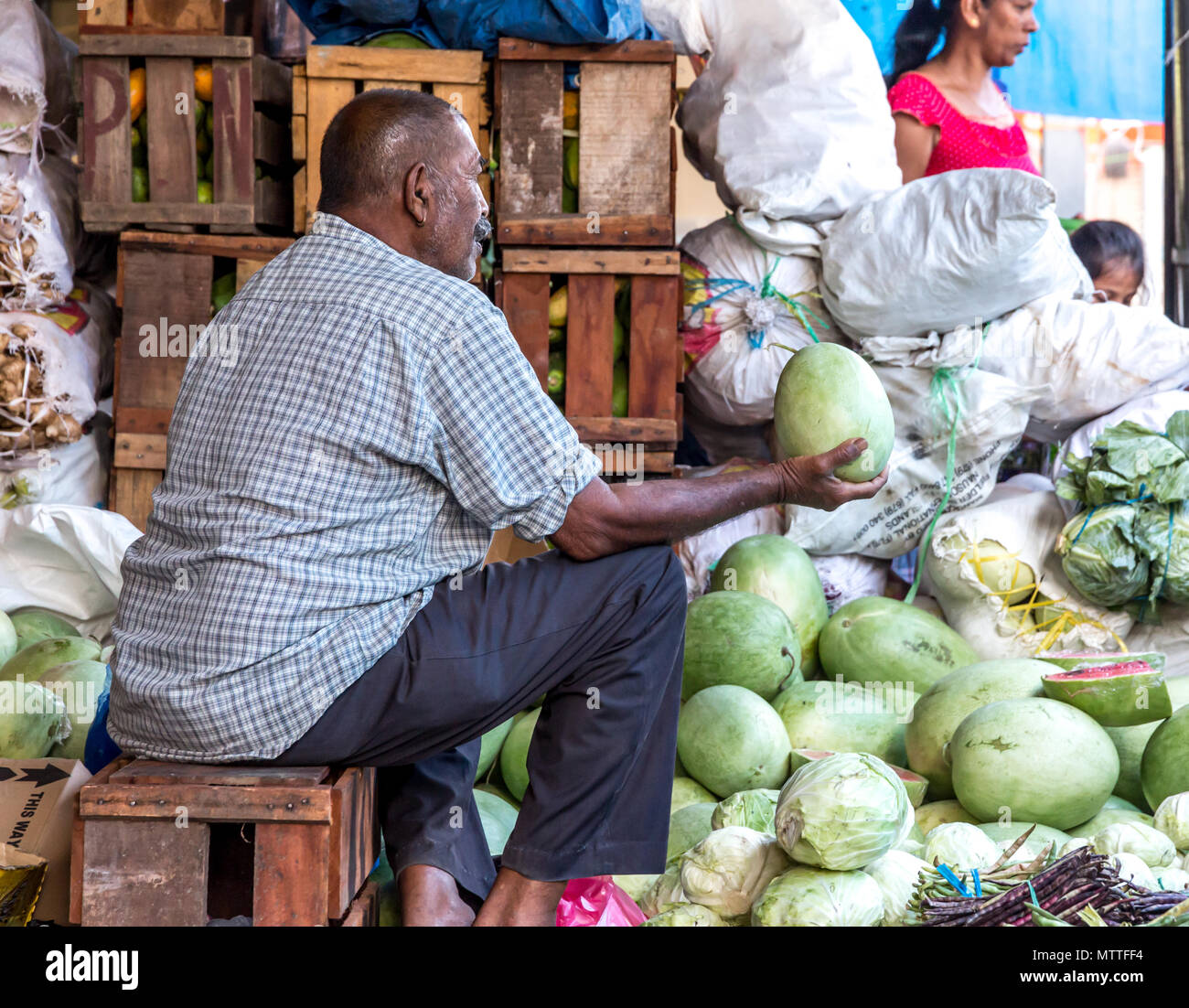 Watermelon merchant at Fijian vegetable market in Nadi, Fiji Stock Photo