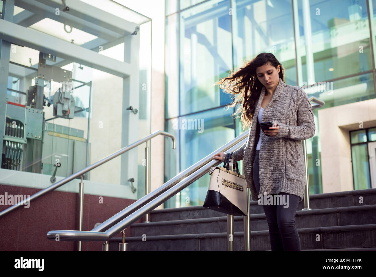 Woman Go Downstairs Hi-res Stock Photography And Images - Alamy