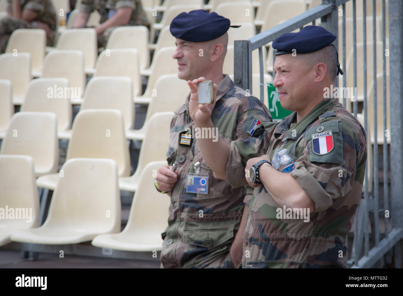French soldiers are entertained watching the dress rehearsal for the Citadelle 350 anniversary military show, May 25, 2018.  US Army photo by Sgt Joseph Agacinski/released. Stock Photo
