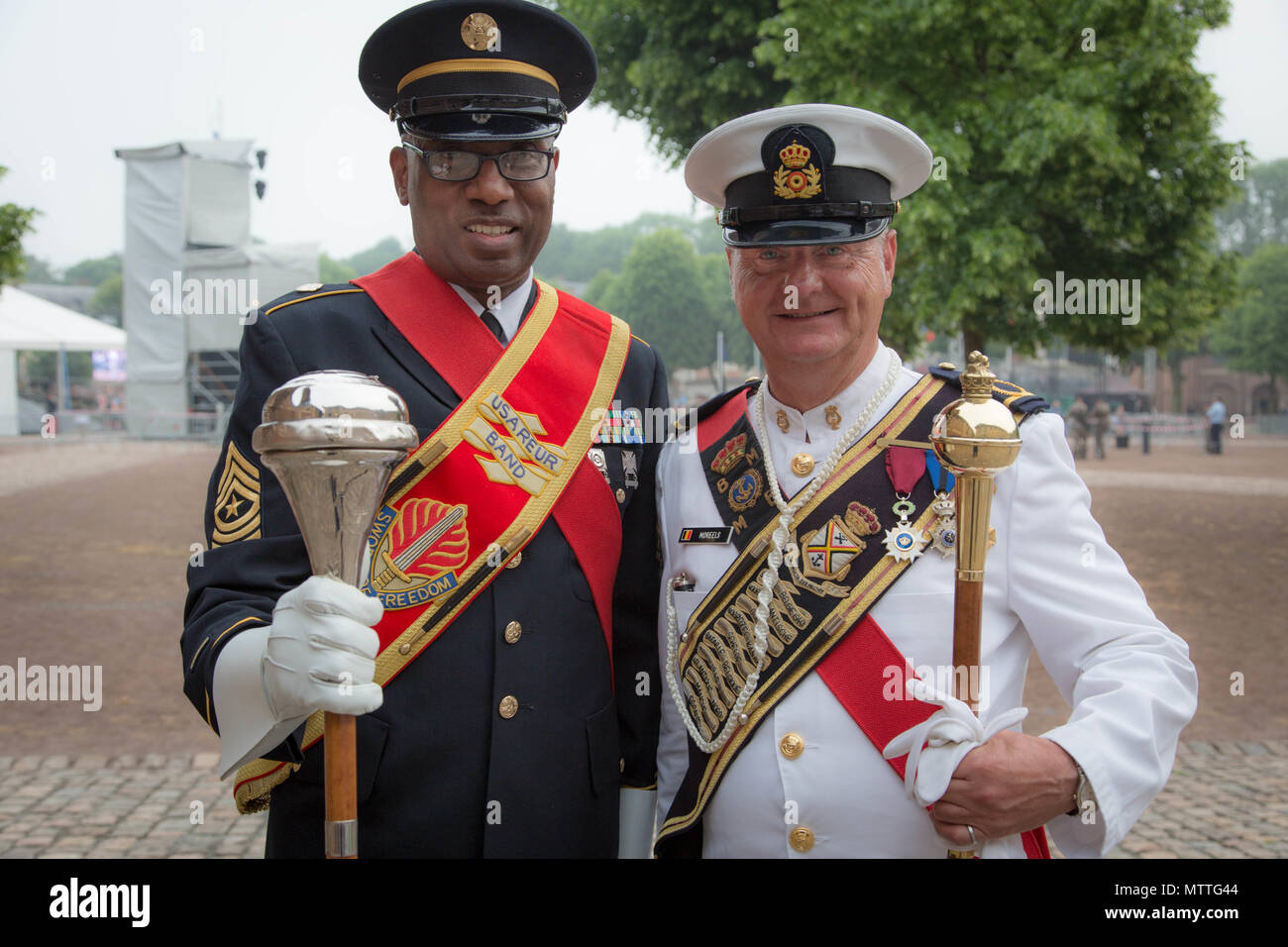US drum major SGM Jesse L. Hughes Jr. stands alongside Major Hans Moreels of the German Heeresmusikorps during the Citadelle 350 anniversary military show, May 25, 2018.  US Army photo by SGT Joseph Agacinski/released. Stock Photo