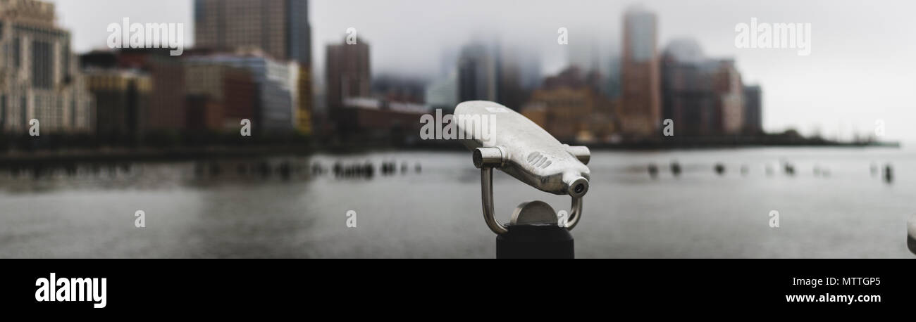 Viewfinder  overlooking lower Manhattan covered in fog Stock Photo