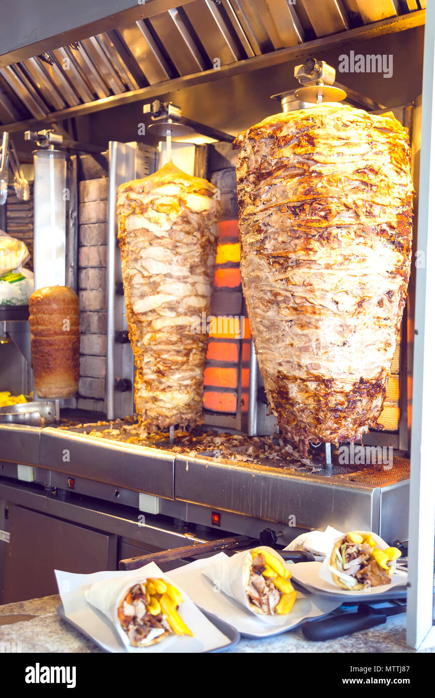 Greek gyros shop. Greek national fast food, traditional Greek cuisine,  stacked meat roasting. Selective focus and vintage style Stock Photo - Alamy