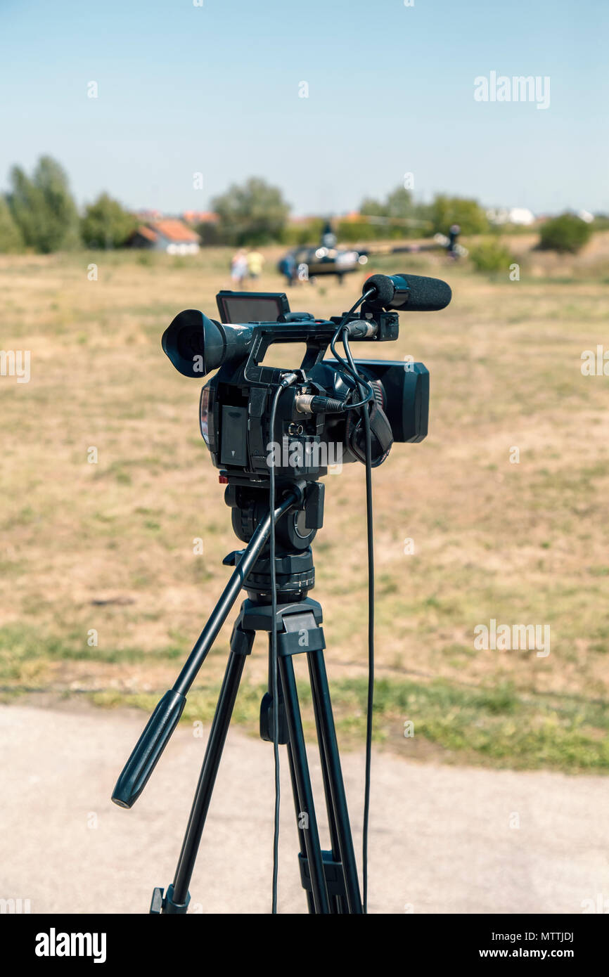 Video camera, outdoor setup and covering an event with professional  equipment Stock Photo - Alamy